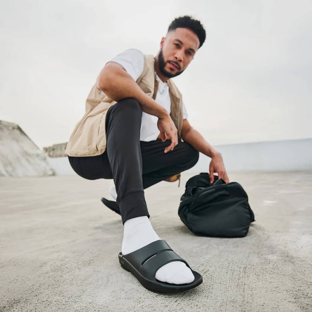 Click to shop men's OOFOS at DSW Designer Shoe Warehouse.