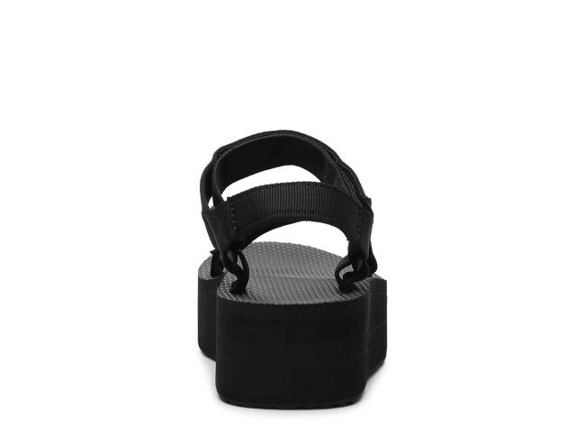 Black and white teva flatform store