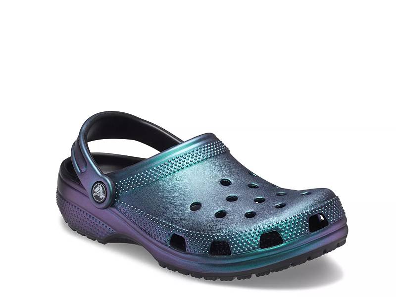 black iridescent crocs with tassels