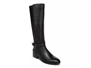 black trousers wearing black leather knee length riding boots - Playground