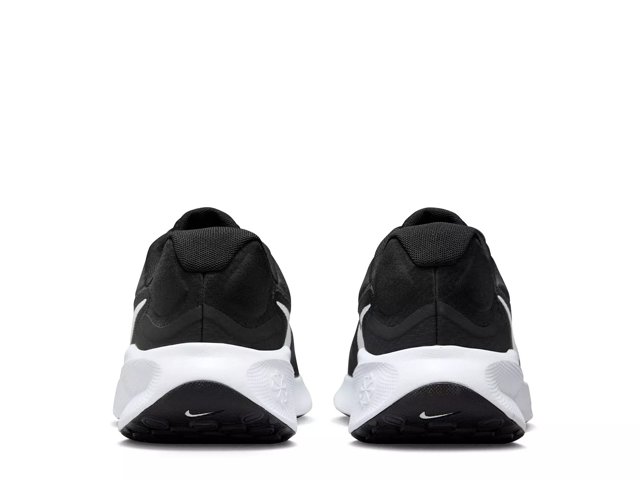 Black and white nike revolution running shoes sale