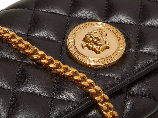 Repeat Small leather shoulder bag in brown - Versace