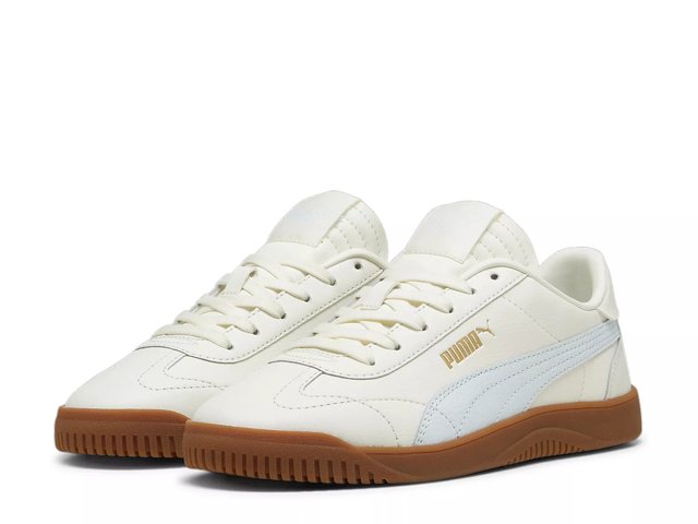 White pumas with gold tip hot sale