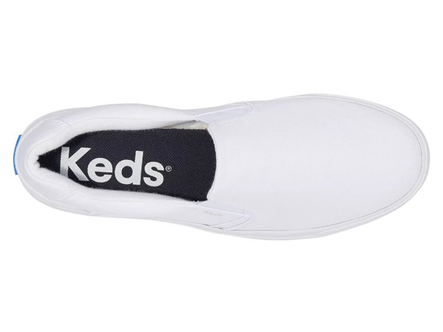 Keds white top slip on sneakers
