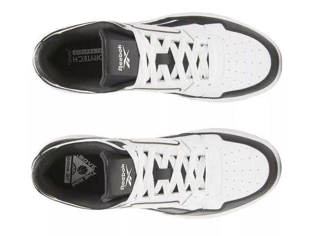 White rimmed black sneakers 2025