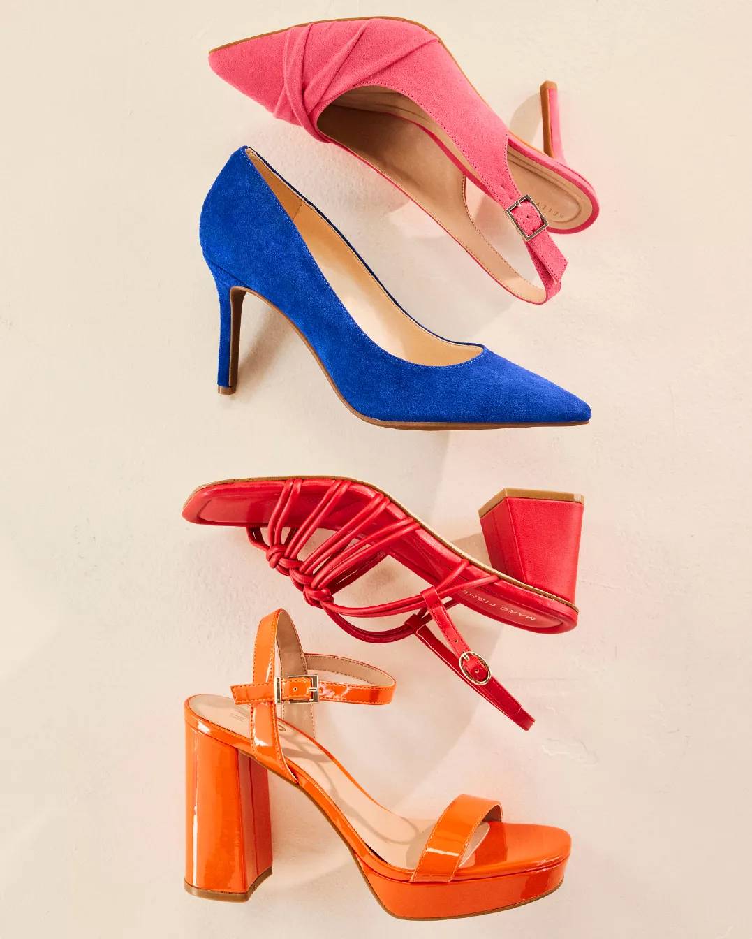 Four different colored heeled shoes