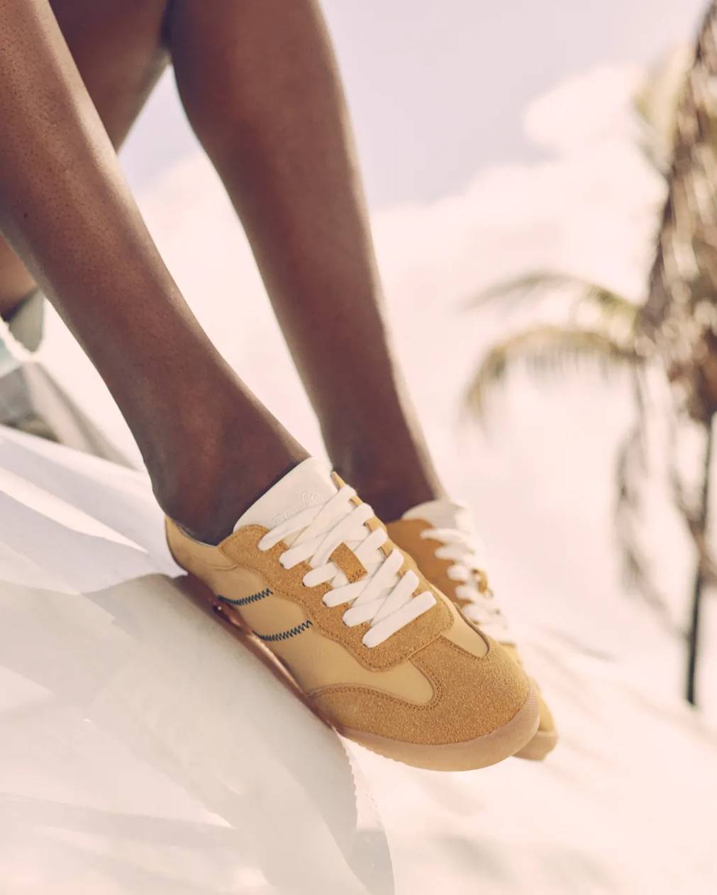 Click to read about How to Wear Sneakers with Dresses
