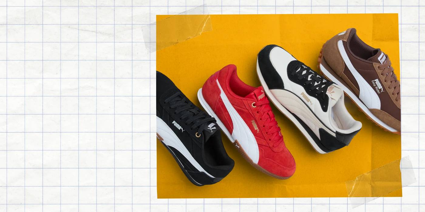 Four pairs of Puma sneakers lined up.