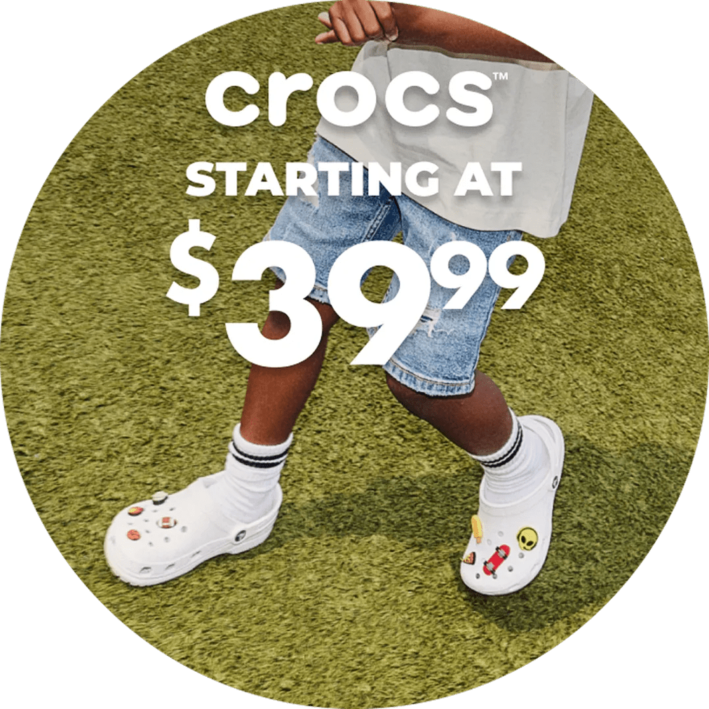 Featuring a model in white crocs with jibbitz.
